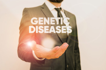 Conceptual hand writing showing Genetic Diseases. Concept meaning disease caused by an abnormality in an individual s is genome Male human with beard wear formal working suit clothes hand