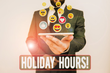 Writing note showing Holiday Hours. Business concept for Overtime work on for employees under...