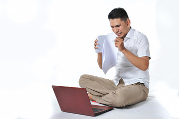 Young Asian entrepreneur/freelancer or business man dizzy or angry