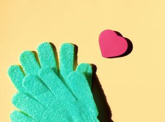 Green gloves and heart sponge.