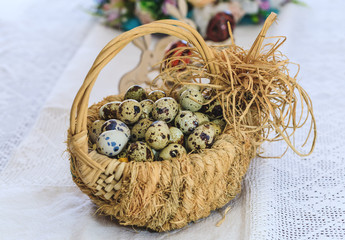 Rotten eggs in a basket of vegetable vibes on a tablecloth decorated with traditional Romanian motifs. Conceptual picture for diet food Easter Holiday