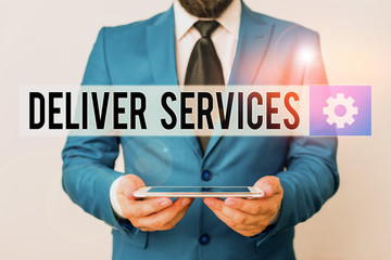 Text sign showing Deliver Services. Business photo text the act of providing a delivery services to customers Businessman in blue suite with a tie holds lap top in hands