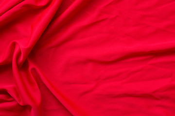 Beautiful red fabric is suitable for making backgrounds in various concept designs in the top view.