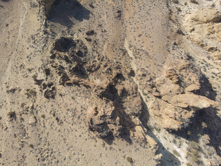 Desert with rocks, top view, texture with space