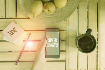 Writing note showing Speed Recognition. Business concept for technology used to detect and recognize over speeding car woman with laptop smartphone and office supplies technology