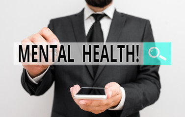 Text sign showing Mental Health. Business photo showcasing demonstratings condition regard to their psychological well being Male human wear formal work suit hold smart hi tech smartphone use one hand