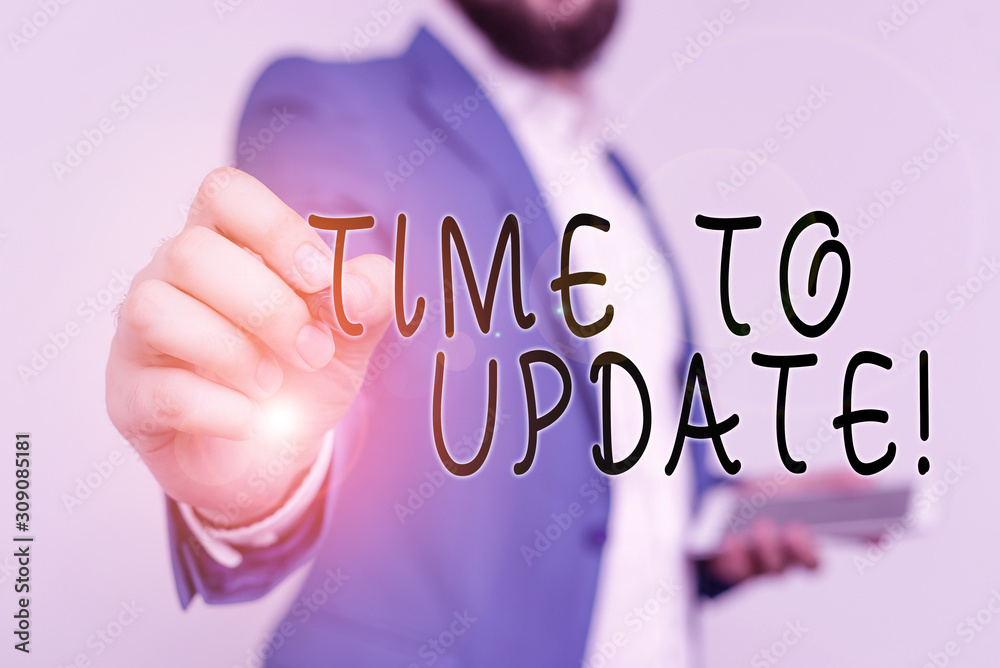 Wall mural writing note showing time to update. business concept for this is right moment to make something mor