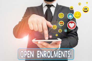 Conceptual hand writing showing Open Enrolments. Concept meaning when employees may make changes to...