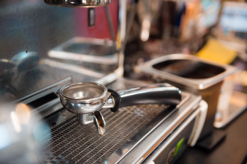 coffee tamper on coffee machine
