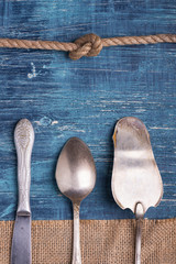 kitchen utensils on textured background