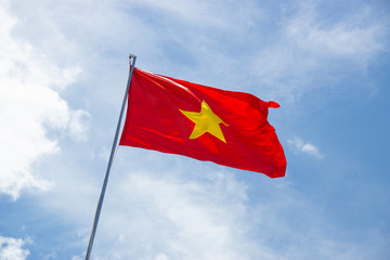 Red flag of Vietnam developing in the wind.