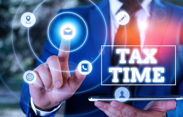 Conceptual hand writing showing Tax Time. Concept meaning compulsory contribution state revenue levied government on workers