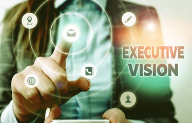 Conceptual hand writing showing Executive Vision. Concept meaning inspires those around them to...