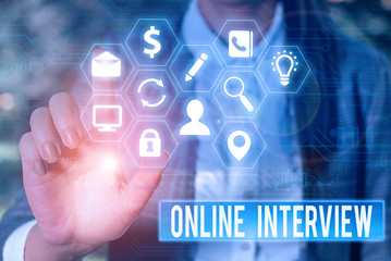 Conceptual hand writing showing Online Interview. Concept meaning method conducted using computermediated communication