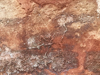 Old wall background - city building decay texture. Urban decline pattern with peeling paint.