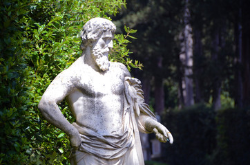 statue of man in garden