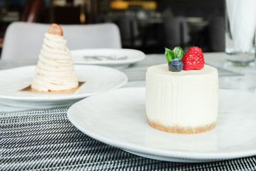 Round fresh cheesecake with strawberry and blueberry 