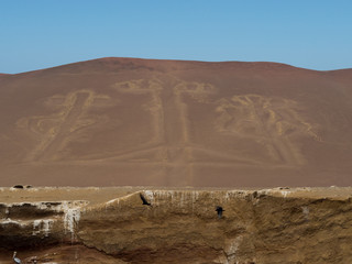 Candelabra of the Andes in Pisco Bay, Peru. Prehistoric geoglyph, Paracas Peninsula