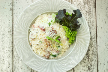 risotto with mushrooms on white plate