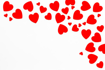 Valentine's Day design. Red hearts frame on white background top-down copy space