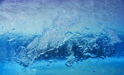 Ice background. The frozen texture of the water