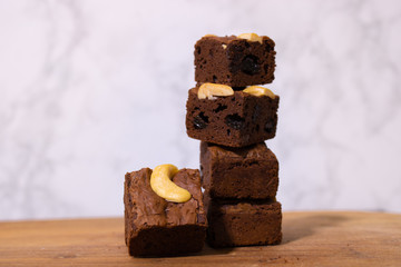 Homemade Raisin Rye Brownies Set up as a display shelf, 1 piece with nuts in front Place the image in the middle.