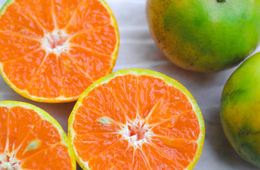 Thai Tangerine The taste is sweet until the ants come up to eat the orange skin. The source of the true breed is in Bang Mot, filmed in half-clear, on a white wood grain surface.