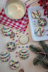 Fototapeta na wymiar Traditional home made Christmas Lights Cookies on a festive christmas background