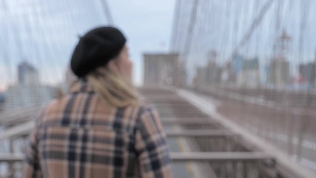 Young attractive woman in New York out of focus push in to close up 