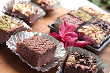  Nutella Brownie yummy Bakery homemade. There are many flavors and decorated with dark pink flowers.