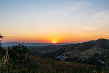 Fototapeta premium beautiful blue sky high peak mountains mist fog wildlife green forest at Khao Koh Phu Tub Berk Phetchabun Thailand guiding idea long weekend for backpacker camping hiking 