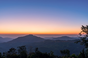 beautiful blue sky high peak mountains mist fog wildlife green forest at Khao Koh Phu Tub Berk Phetchabun Thailand guiding idea long weekend for backpacker camping hiking  