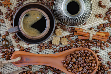 Black coffee on an old background in a cup