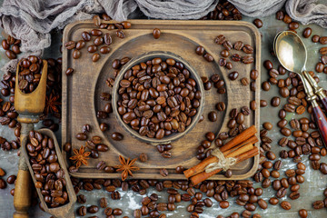 Coffee grains on a table with accessories for coffee