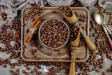 Coffee grains on a table with accessories for coffee