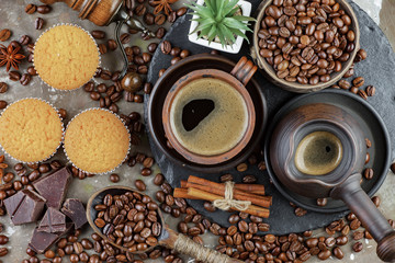 Black coffee on an old background in a cup