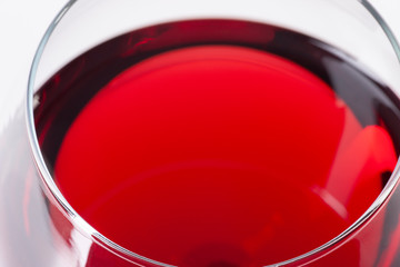Red wine in glass, viewed from the top corner.