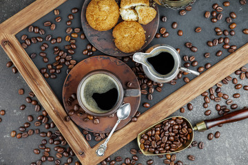 Black coffee on an old background in a cup
