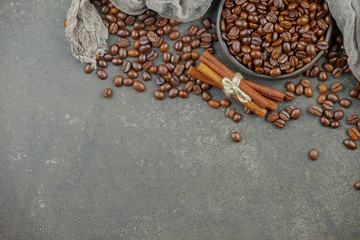 Coffee in a cup and saucer on an old background.