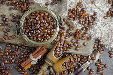 Black coffee beans on an old background