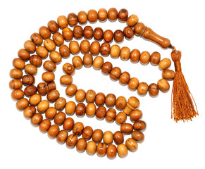 Natural wooden rosary isolated on white background