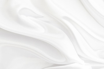 White gray satin texture that is white silver fabric silk background with beautiful soft blur pattern natural.