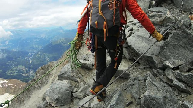Men are climbing to the top of the mountain. Mount Blanc Mountain. Alps