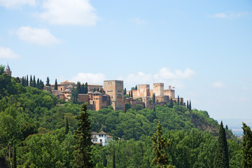 Fototapeta na wymiar View to Alhambra form Sacromonte village famous for its houses made in caves at the hill slopes, Granada, Spain