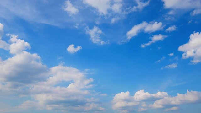 Cloud timelapse on blue sky background