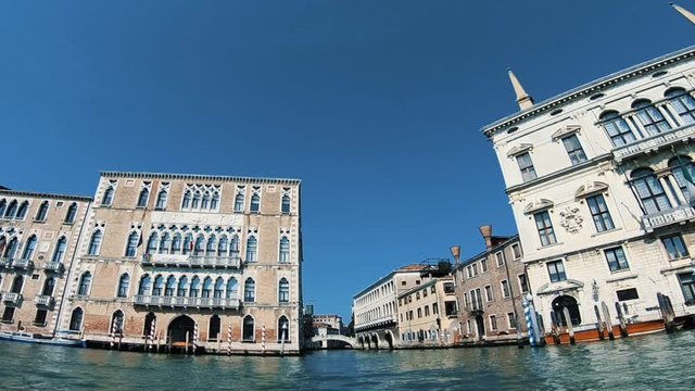 Venice, Italy on a summer day from the Grand canal. Beautiful archtecture of buildings and channel between them