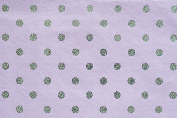 Seamless shiny polka dot wrapping paper. Lilac foil for design of gift wrapping, wrapping paper, wallpaper. Stylish shiny texture