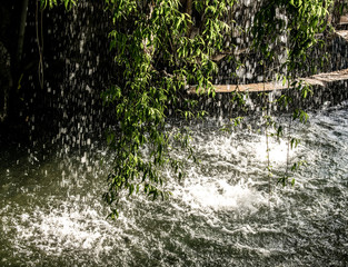 small water fall in a park