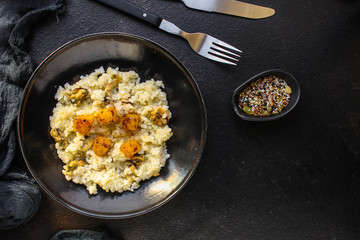 risotto mussels, vegetables (main course, rice seafood) menu concept. food background. top view. copy space