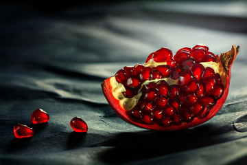 Pieces of ripe pomegranate fruit close-up